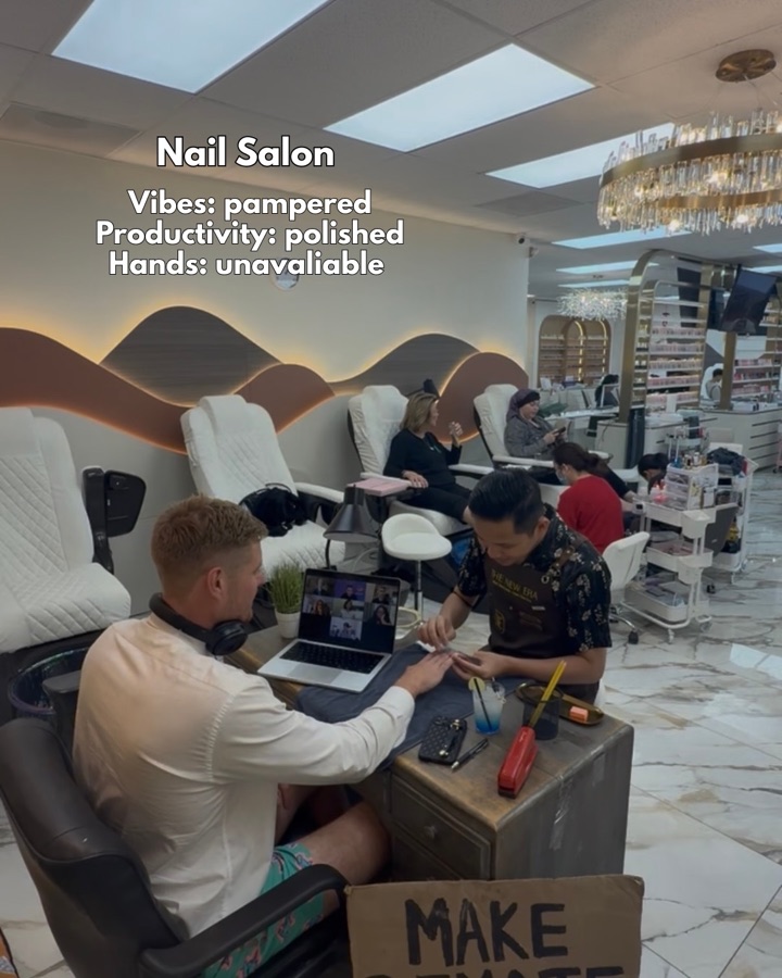 Scotty taking a meeting while getting his nails done